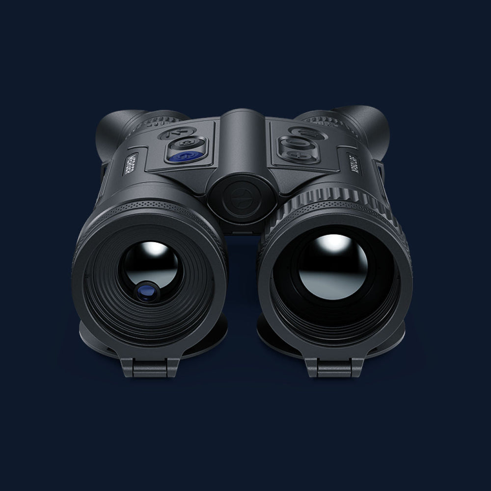 Front view of Pulsar Merger XP35 LRF thermal binoculars showing dual lenses and rugged design. Ideal for long-range thermal detection outdoors.
