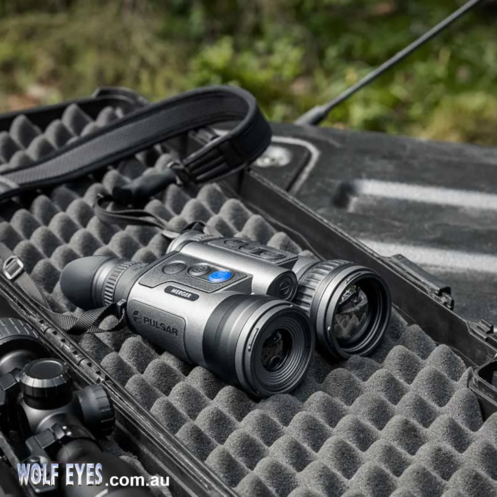 Pulsar Merger XT50 LRF thermal binoculars on a protective case