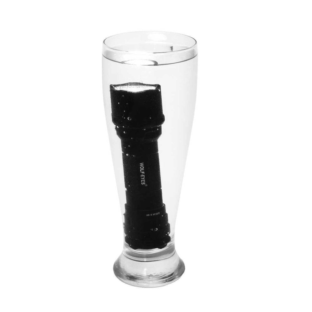 Wolf Eyes Pro Police Ultra LED Rechargeable Torch underwater showing waterproof