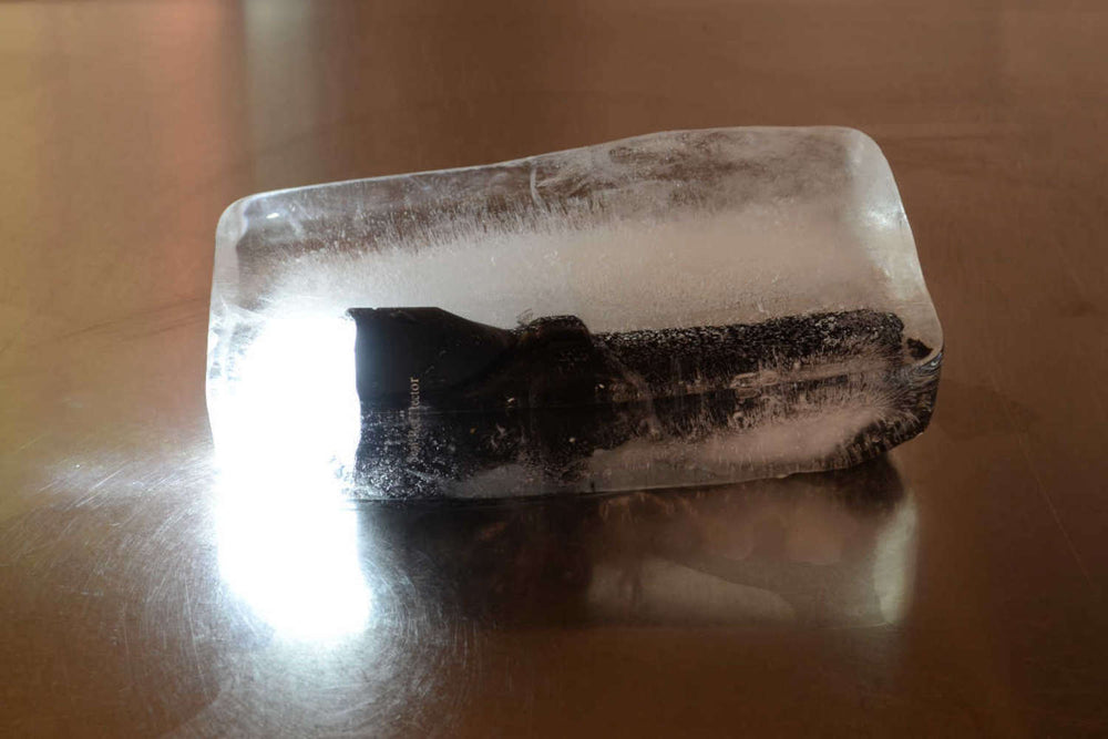 Wolf Eyes Seal Pro Ultra LED torch inside ice cube